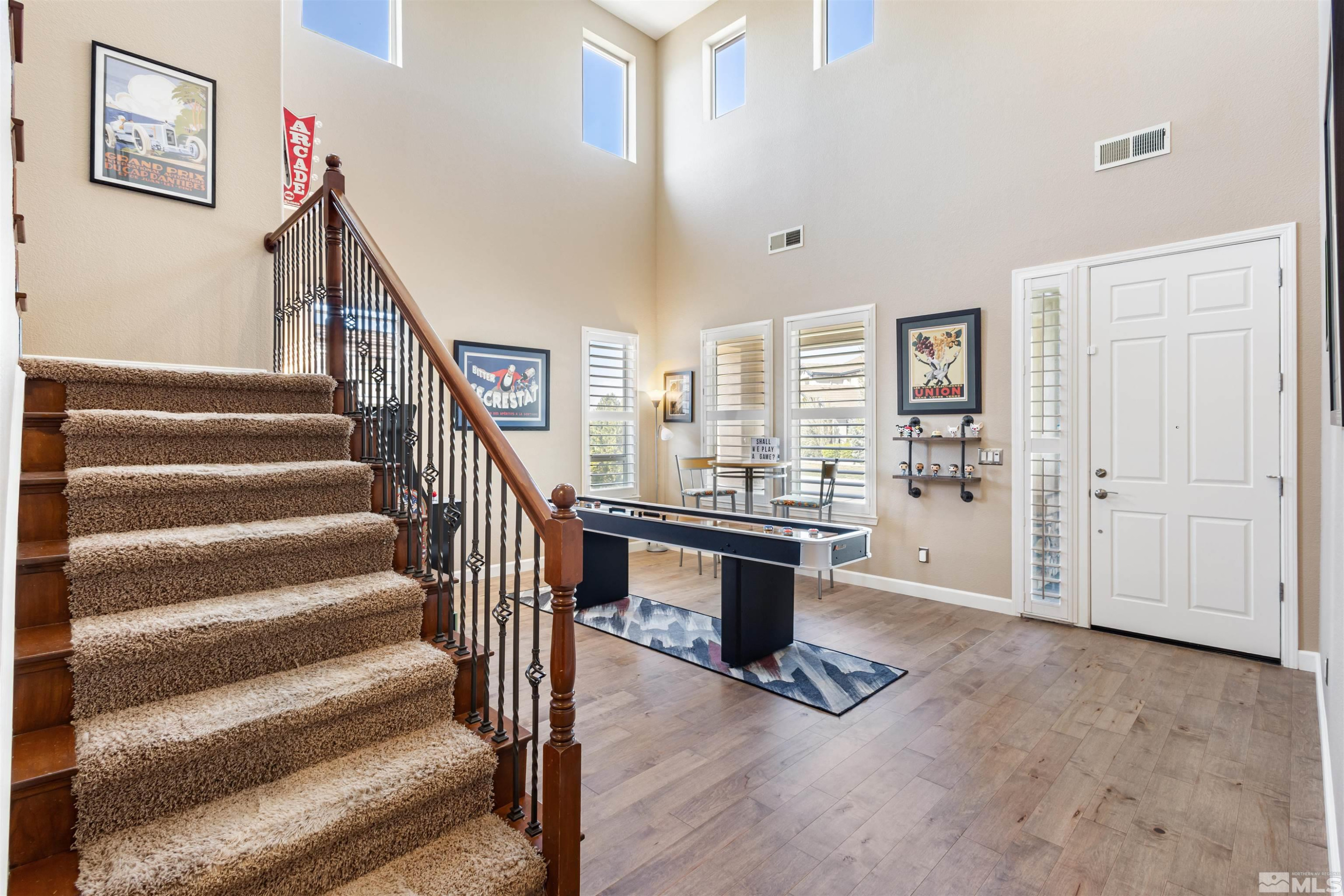 14025 Tagor Road Reno, NV 89521 - Photo 6 of 39 a view of entryway and hall with wooden floor