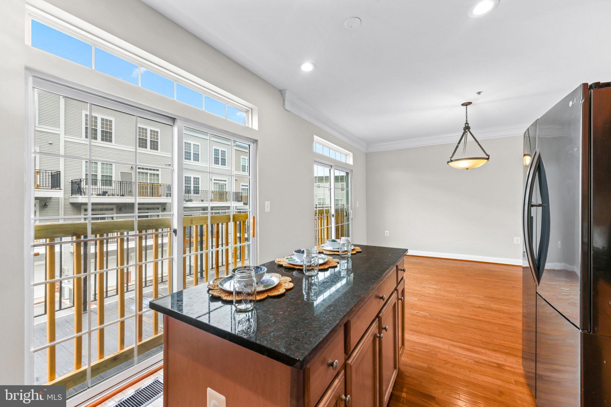 224 North Summit Avenue Gaithersburg, MD 20877 - Photo 16 of 34 a dining room with a table and chairs
