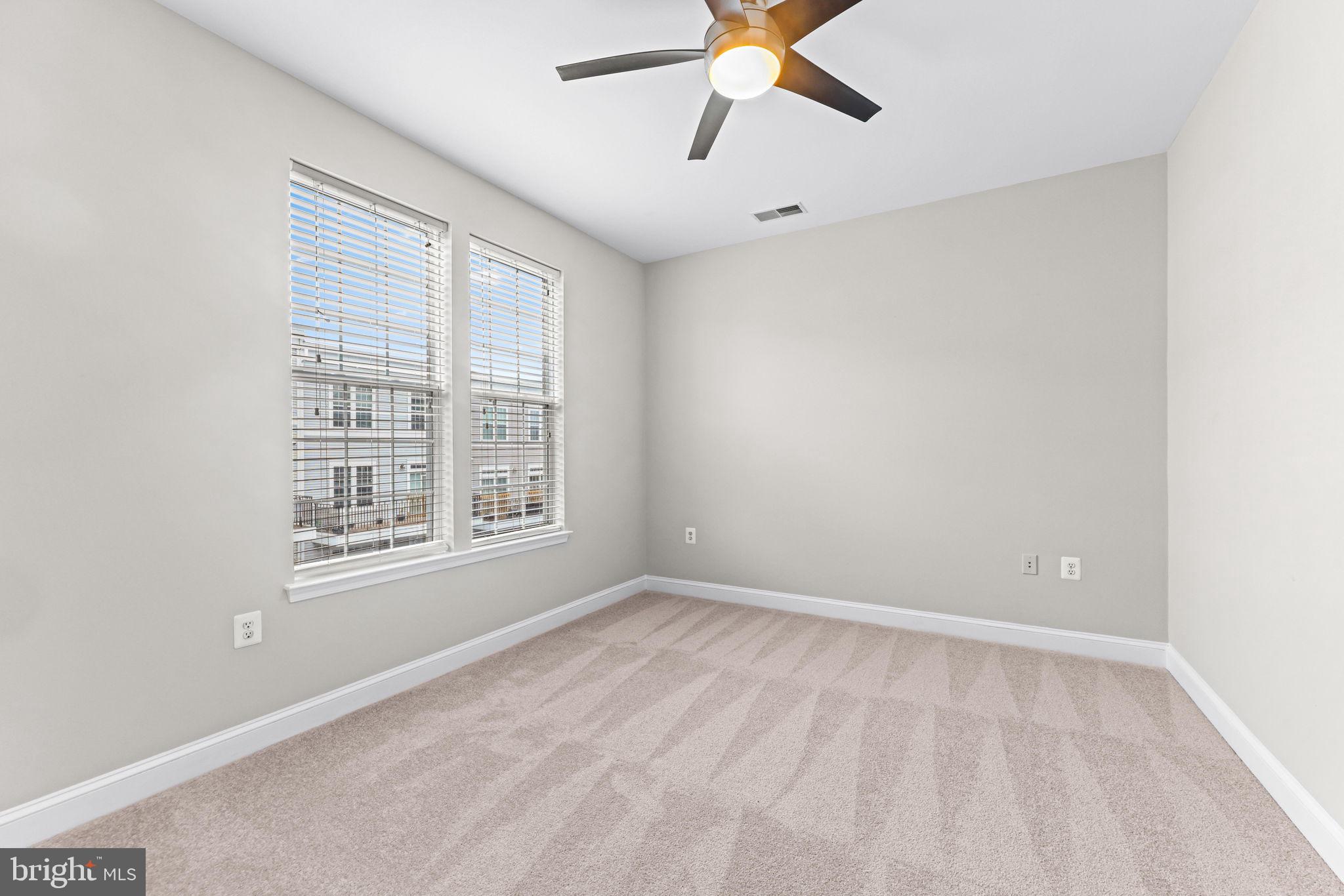 224 North Summit Avenue Gaithersburg, MD 20877 - Photo 25 of 34 a view of an empty room with a window