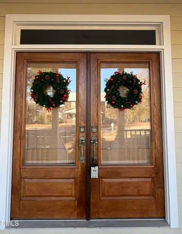 a living room with furniture and a gate