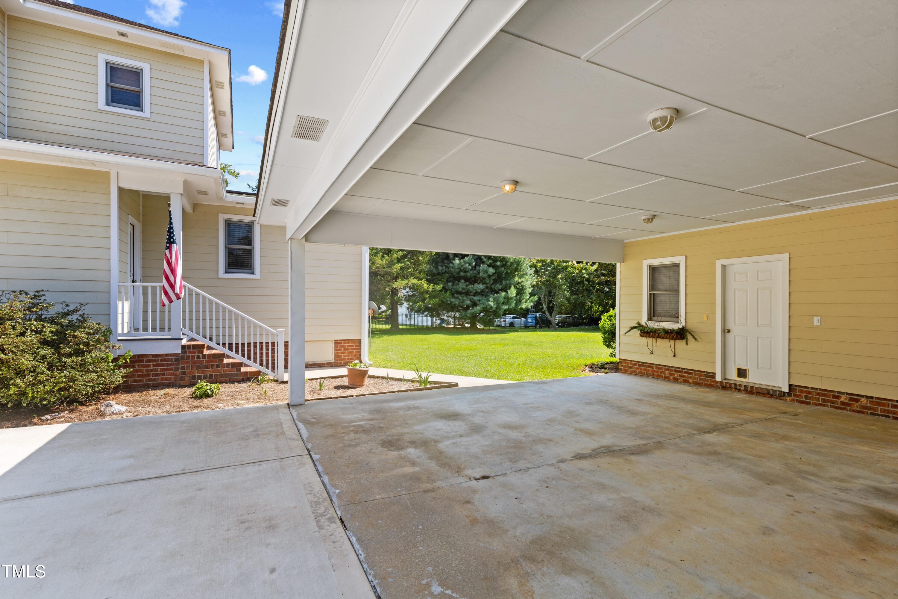 207 North Hopkins Avenue Spring Hope, NC 27882 - Photo 34 of 41 Under Carport