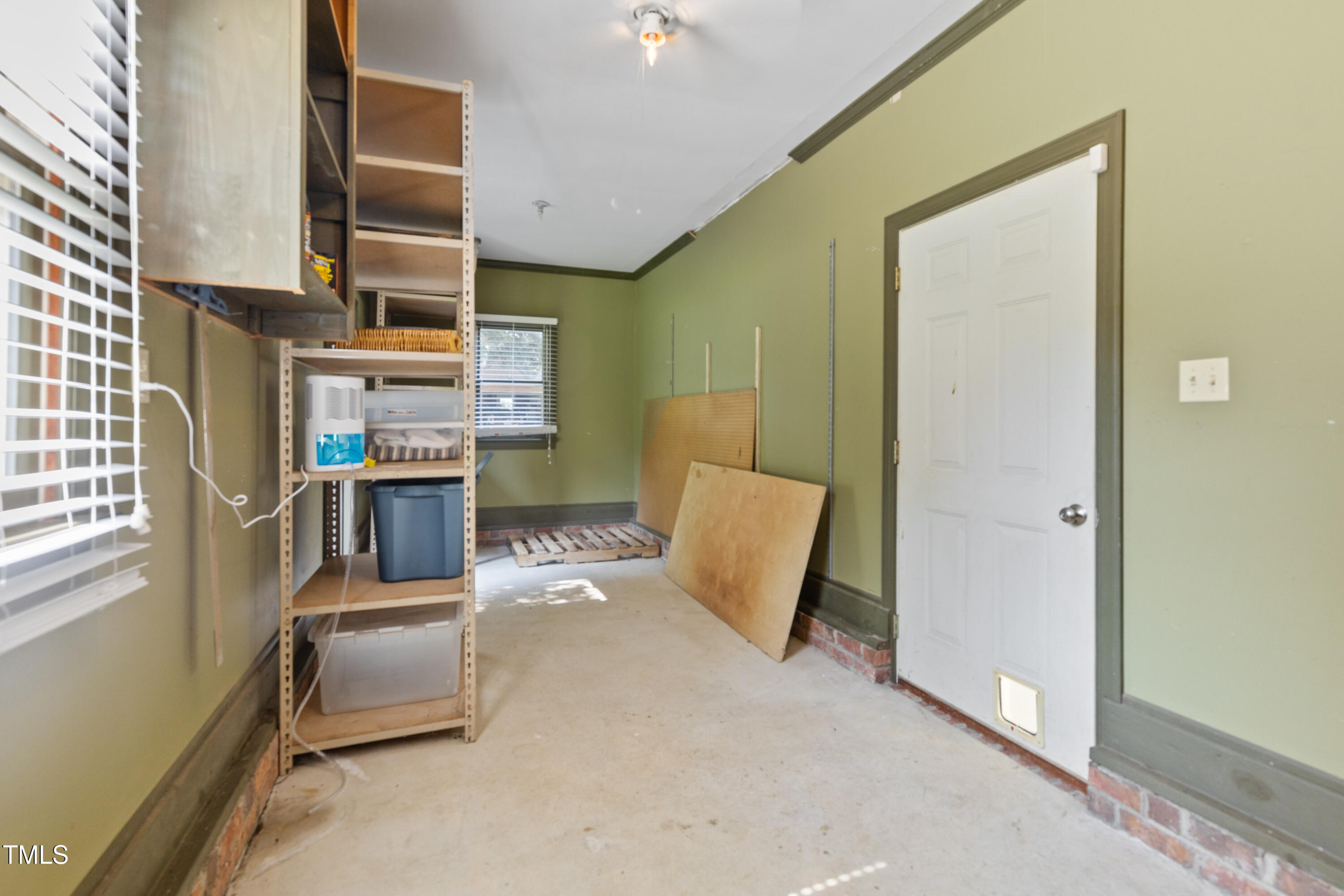 207 North Hopkins Avenue Spring Hope, NC 27882 - Photo 36 of 41 Storage Off Carport