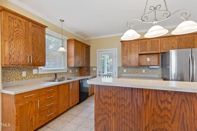 a view of a hallway with a chandelier