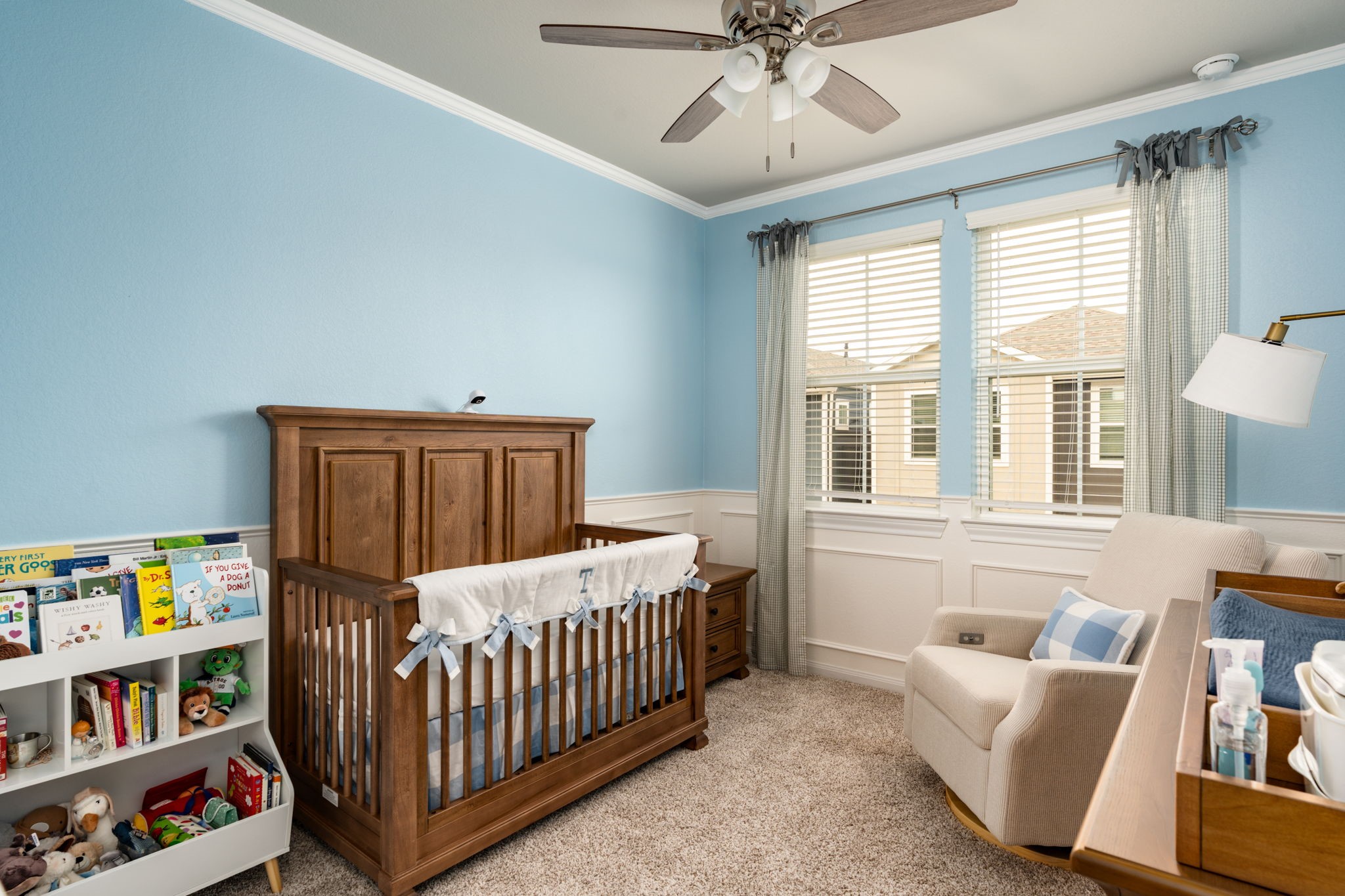 9810 Falling Fern Lane Houston, TX 77080 - Photo 13 of 30 1 of the secondary bedrooms features crown molding and beautiful wall paneling.