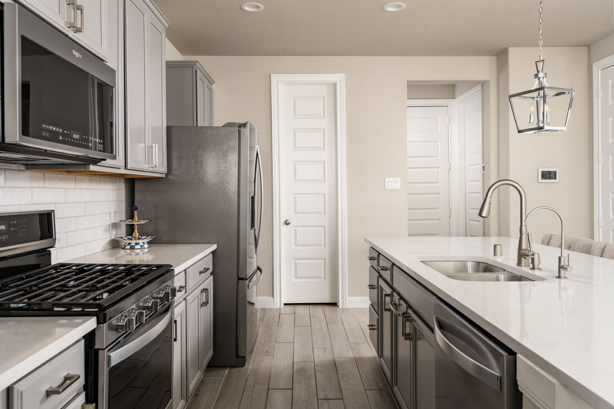 9810 Falling Fern Lane Houston, TX 77080 - Photo 6 of 30 Upgraded kitchen cabinet drawers for added storage & functionality!