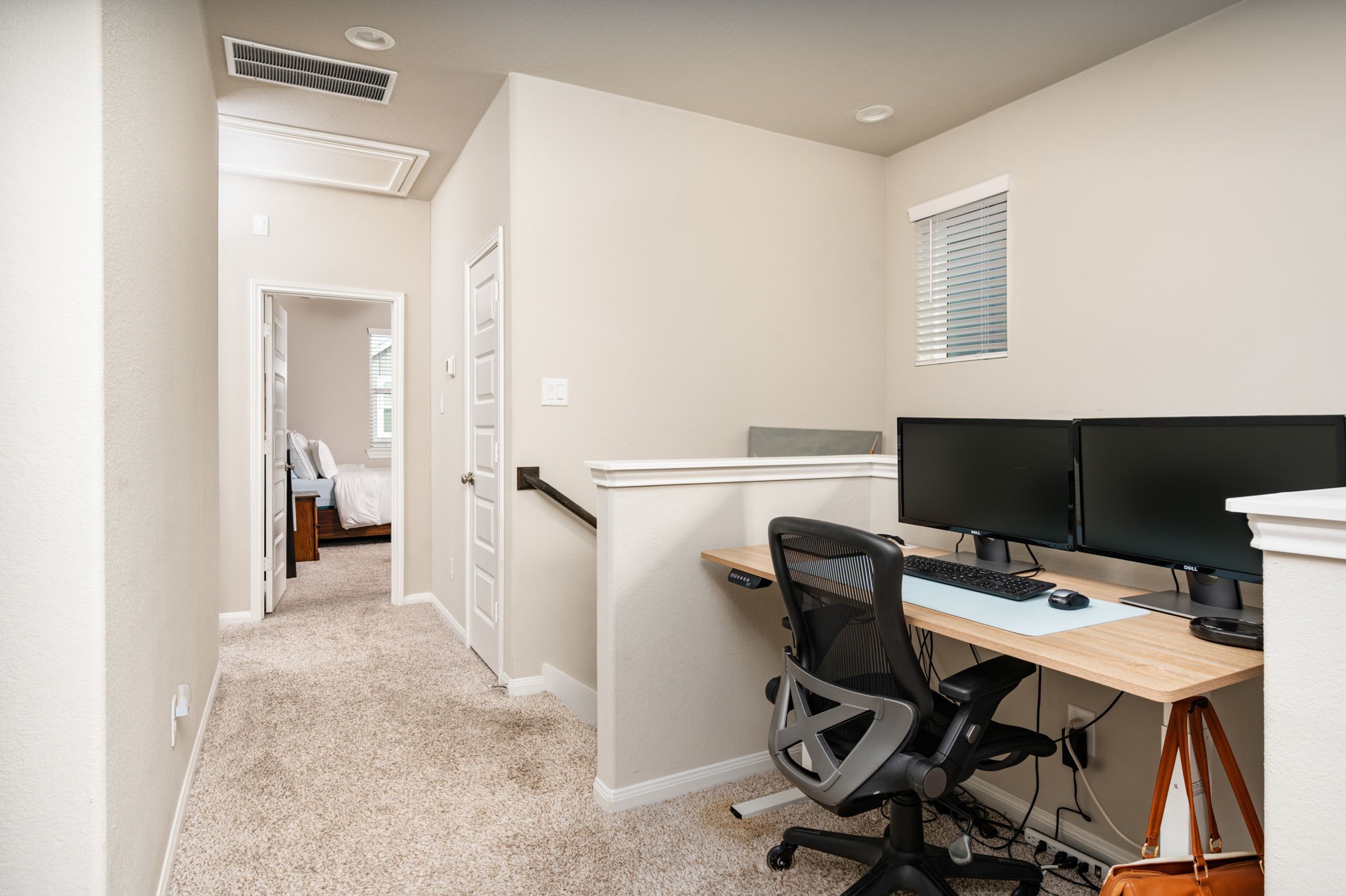 9810 Falling Fern Lane Houston, TX 77080 - Photo 10 of 30 Clever nook on the 2nd floor landing space, perfect for a work from home solution.