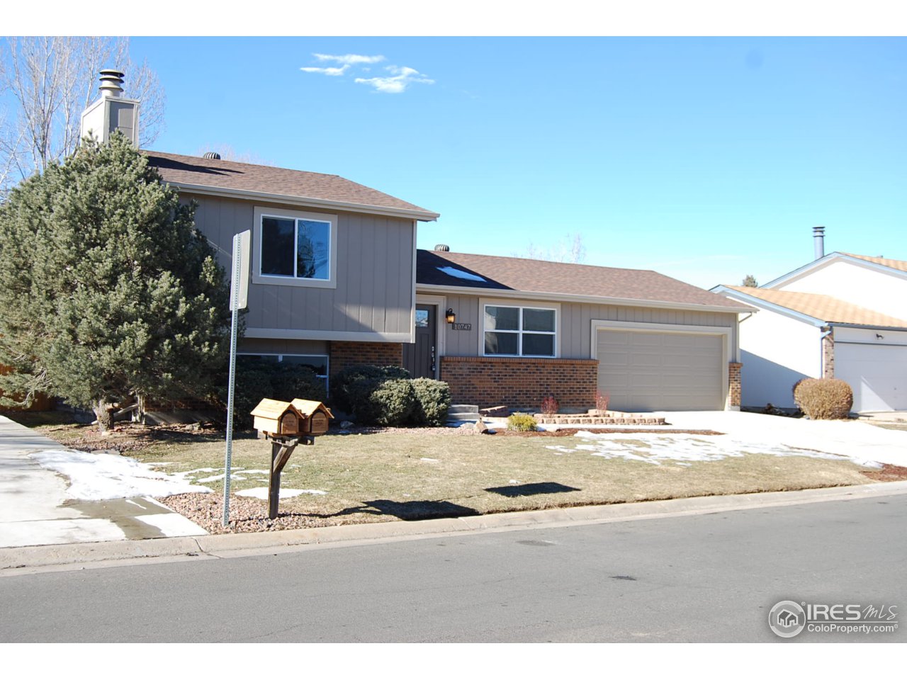 10747 Routt Street Westminster, CO 80021 - Photo 2 of 10 a house view with a outdoor space