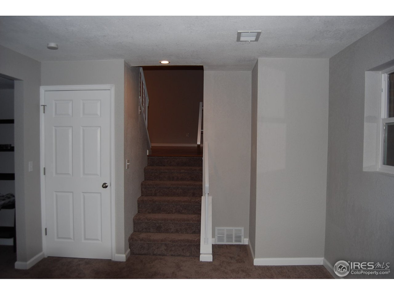 10747 Routt Street Westminster, CO 80021 - Photo 9 of 10 a view of entryway with wooden floor