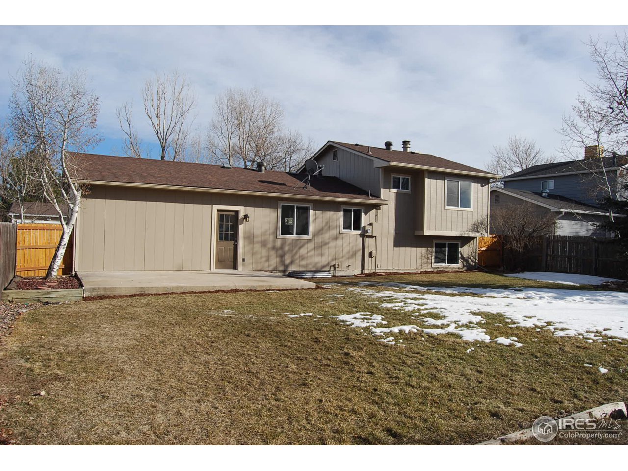 10747 Routt Street Westminster, CO 80021 - Photo 10 of 10 a view of a house with a yard