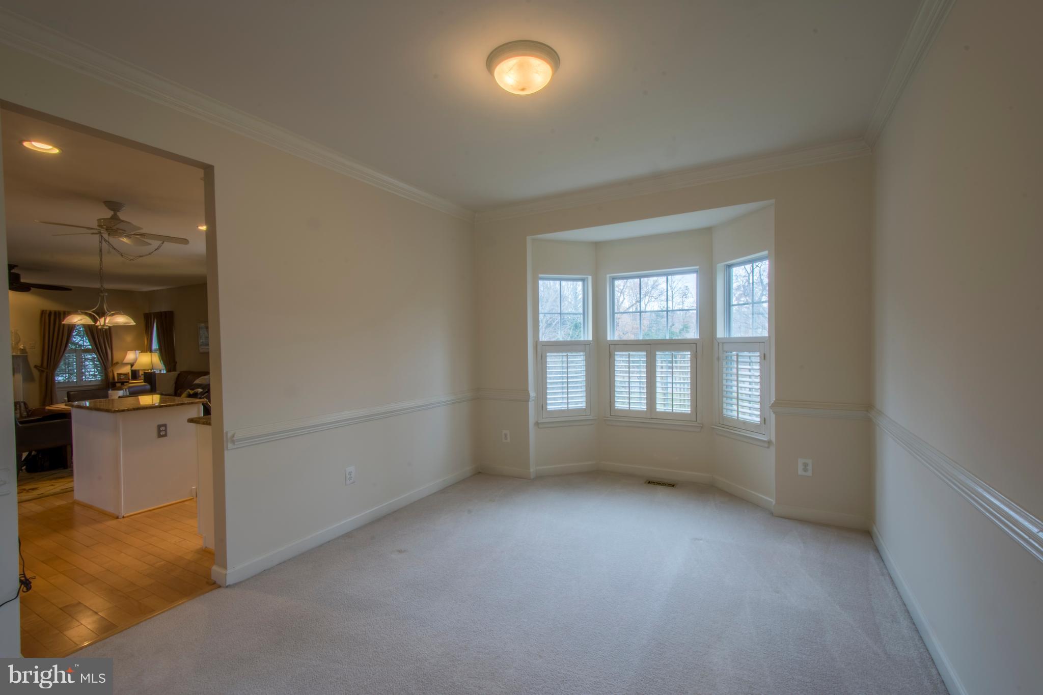 3202 Homewood Road Davidsonville, MD 21035 - Photo 12 of 62 Dining Room With Chair Rail And Crown Moulding