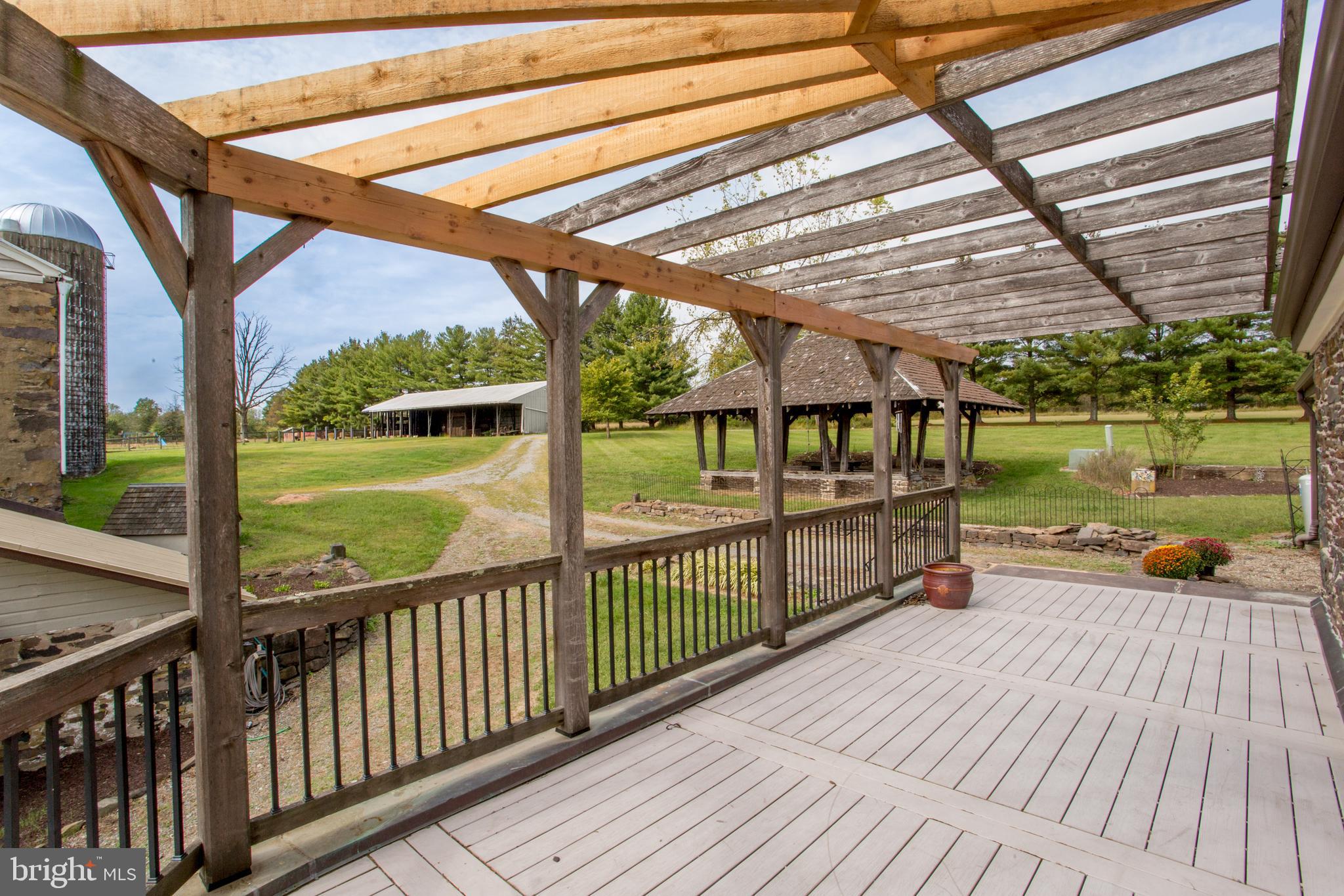 96 Stony Brook Road Hopewell, NJ 08525 - Photo 12 of 49 a view of a balcony with wooden floor