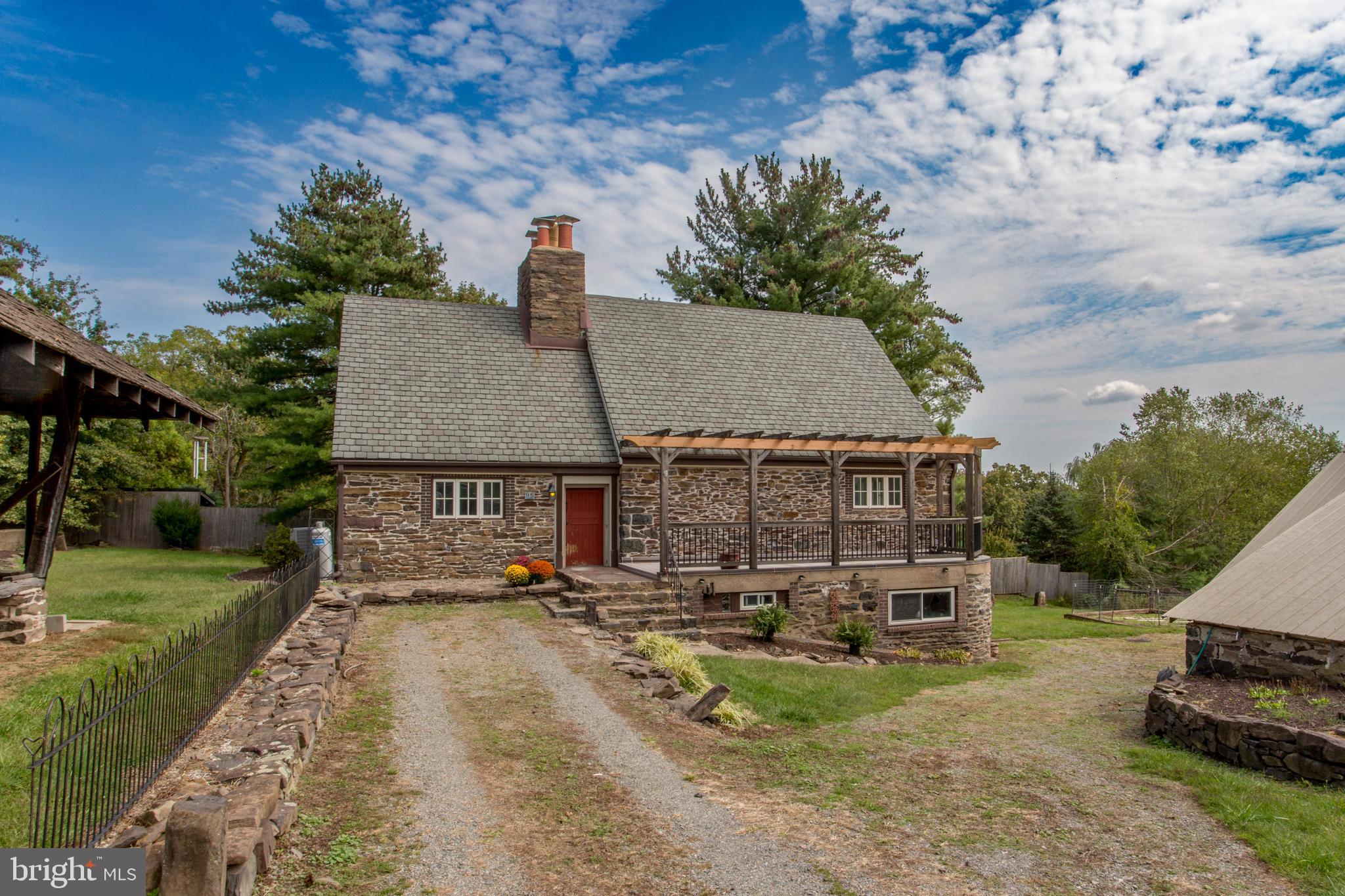 96 Stony Brook Road Hopewell, NJ 08525 - Photo 2 of 49 an aerial view of a house with garden