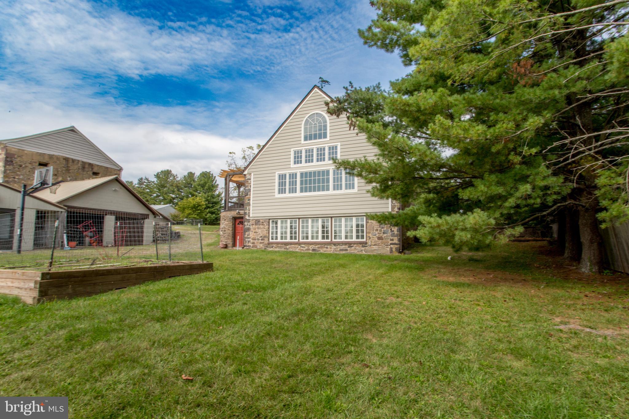 96 Stony Brook Road Hopewell, NJ 08525 - Photo 36 of 49 front view of a house with a yard