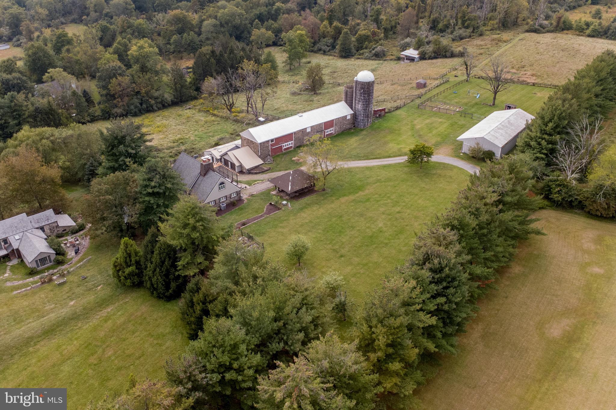 96 Stony Brook Road Hopewell, NJ 08525 - Photo 7 of 49 a backyard of a house with lots of green space