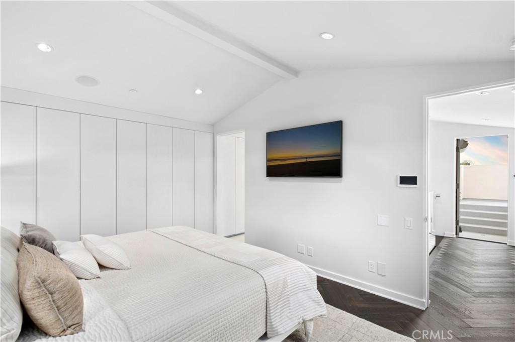 3731 5th Avenue Corona del Mar, CA 92625 - Photo 18 of 36 a bedroom with a bed and a flat screen tv