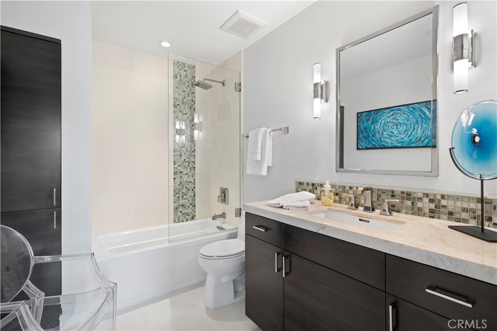 3731 5th Avenue Corona del Mar, CA 92625 - Photo 29 of 36 a bathroom with a sink a toilet and shower