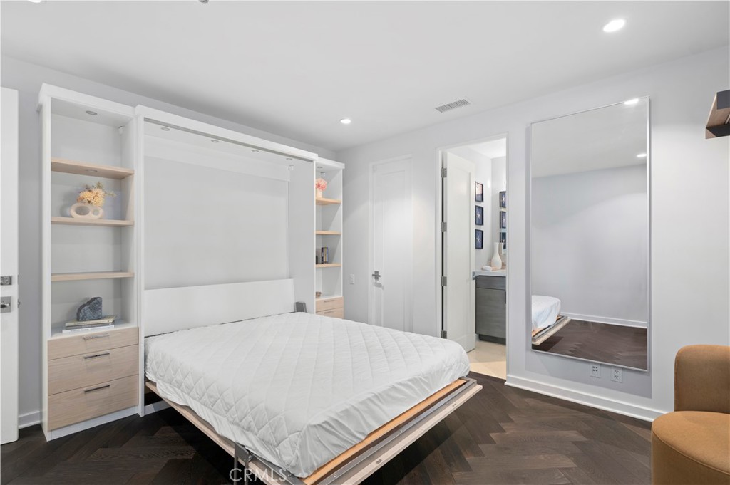 3731 5th Avenue Corona del Mar, CA 92625 - Photo 31 of 36 a bedroom with a bed and a view of bathroom