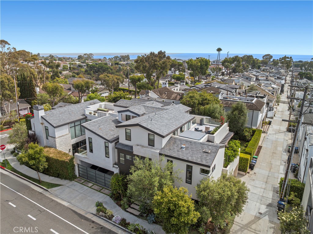 3731 5th Avenue Corona del Mar, CA 92625 - Photo 36 of 36 an aerial view of multiple houses with a mountain view