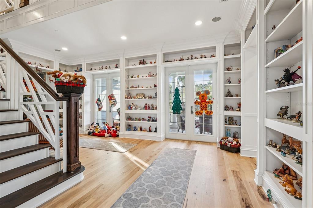 310 Acadia Lane Celebration, FL 34747 - Photo 11 of 52 wooden floor in a room with lots of white walls