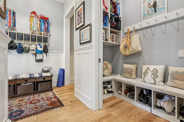 a kitchen with stainless steel appliances a refrigerator sink and cabinets