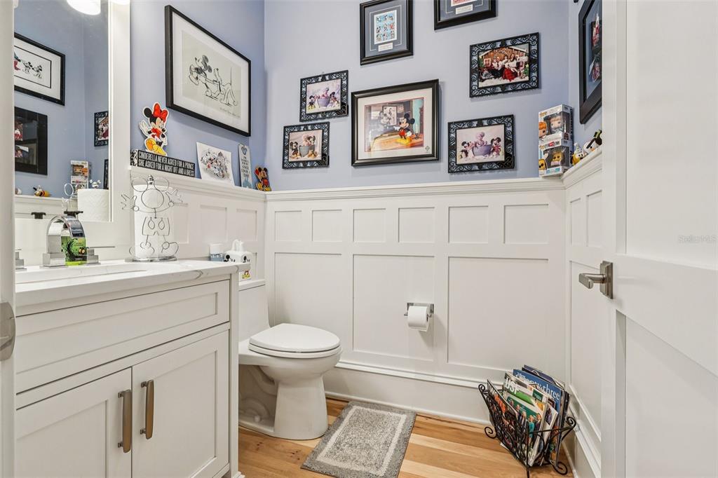 310 Acadia Lane Celebration, FL 34747 - Photo 25 of 52 a bathroom with a toilet and a sink