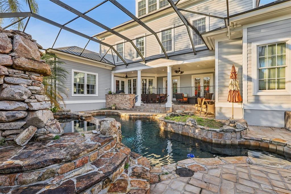 310 Acadia Lane Celebration, FL 34747 - Photo 48 of 52 a view of a house with swimming pool