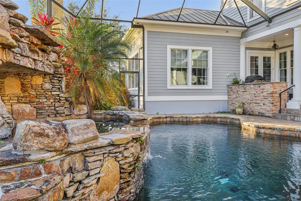 310 Acadia Lane Celebration, FL 34747 - Photo 49 of 52 a front view of a house with swimming pool