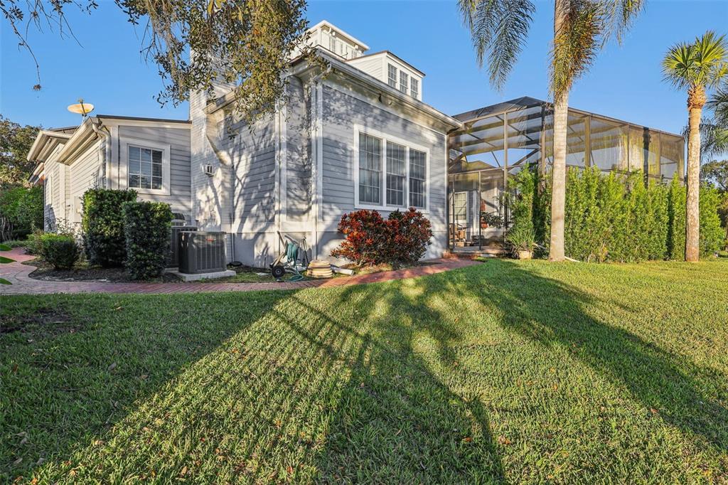 310 Acadia Lane Celebration, FL 34747 - Photo 50 of 52 a view of a front of a house with a yard