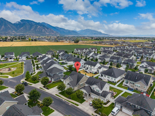 1002 South Yarrow Drive Mapleton, UT 84664 - Photo 4 of 39 Aerial perspective of a contemporary residential community