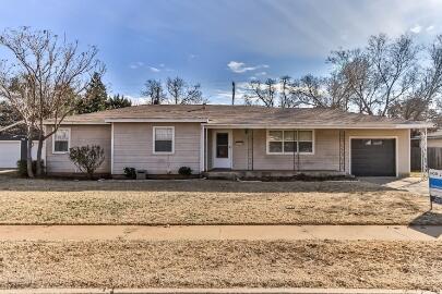4007 39th Street Lubbock, TX 79413 - Photo 1 of 16 a front view of a house with a yard