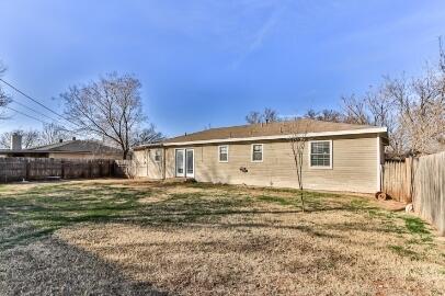 4007 39th Street Lubbock, TX 79413 - Photo 16 of 16 a front view of a house with a yard