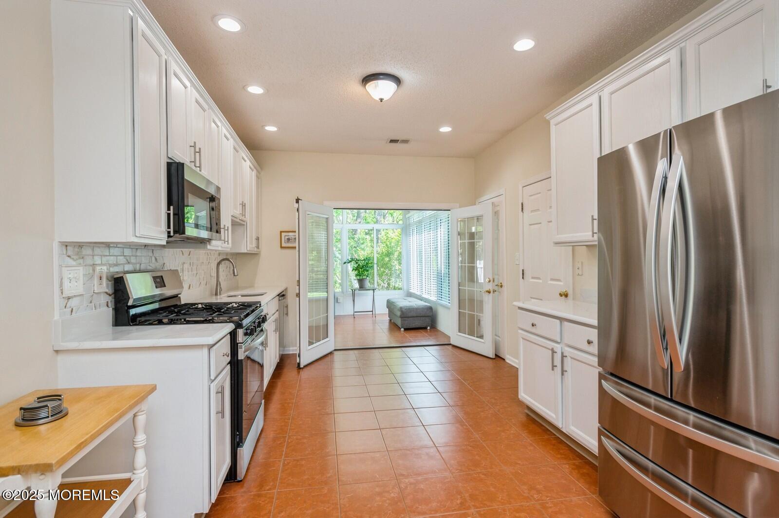 132 Riva Boulevard Brick, NJ 08723 - Photo 8 of 22 08_132RivaBlvd_177001_Kitchen_Large