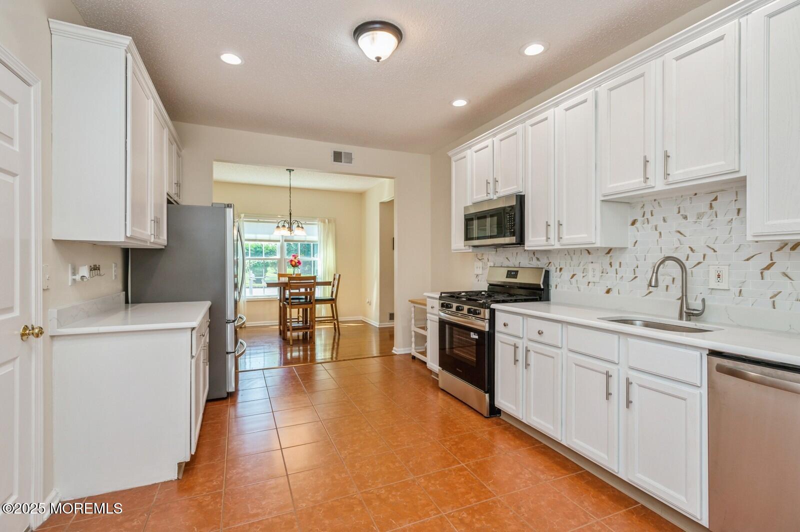 132 Riva Boulevard Brick, NJ 08723 - Photo 9 of 22 09_132RivaBlvd_177002_Kitchen_Large