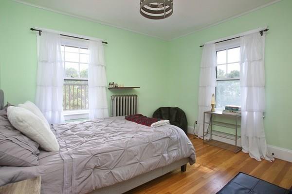 43 Oak Street Newton, MA 02464 - Photo 11 of 20 a bedroom with a bed and a window