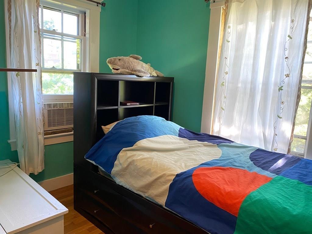 43 Oak Street Newton, MA 02464 - Photo 12 of 20 a bedroom with a bed and a window