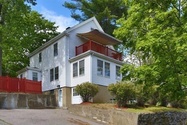 43 Oak Street Newton, MA 02464 - Photo 16 of 20 a front view of a house with a yard