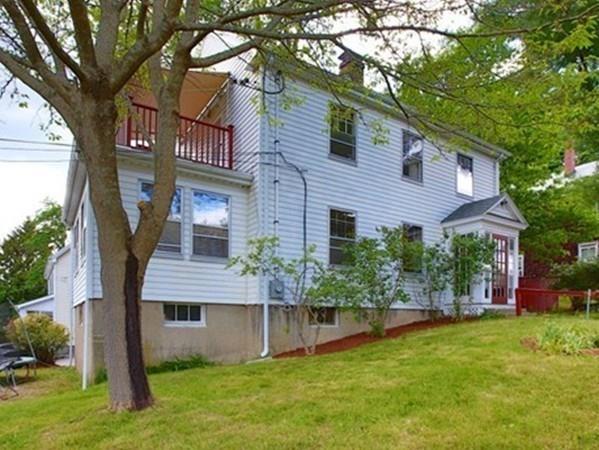 43 Oak Street Newton, MA 02464 - Photo 2 of 20 a front view of house with yard and green space