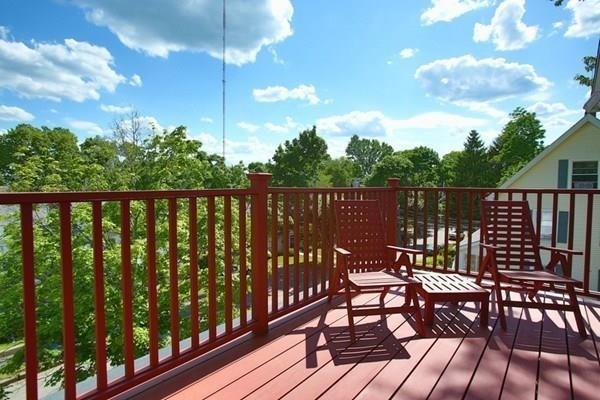 43 Oak Street Newton, MA 02464 - Photo 3 of 20 a view of a chairs on wooden deck