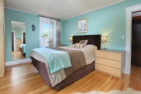 43 Oak Street Newton, MA 02464 - Photo 10 of 20 a bedroom with a bed lamp closet and large window