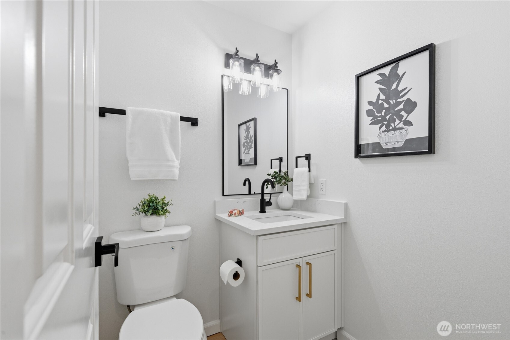 19419 133rd Avenue Southeast Renton, WA 98058 - Photo 23 of 40 a bathroom with a toilet sink and mirror