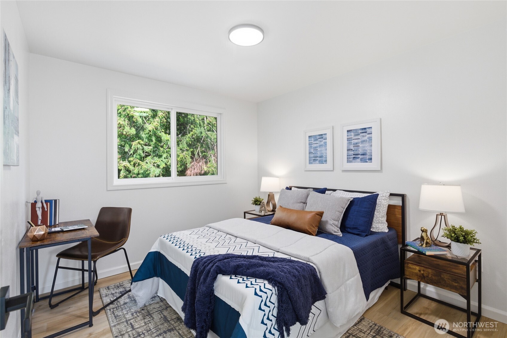 19419 133rd Avenue Southeast Renton, WA 98058 - Photo 25 of 40 a bedroom with a bed and a window
