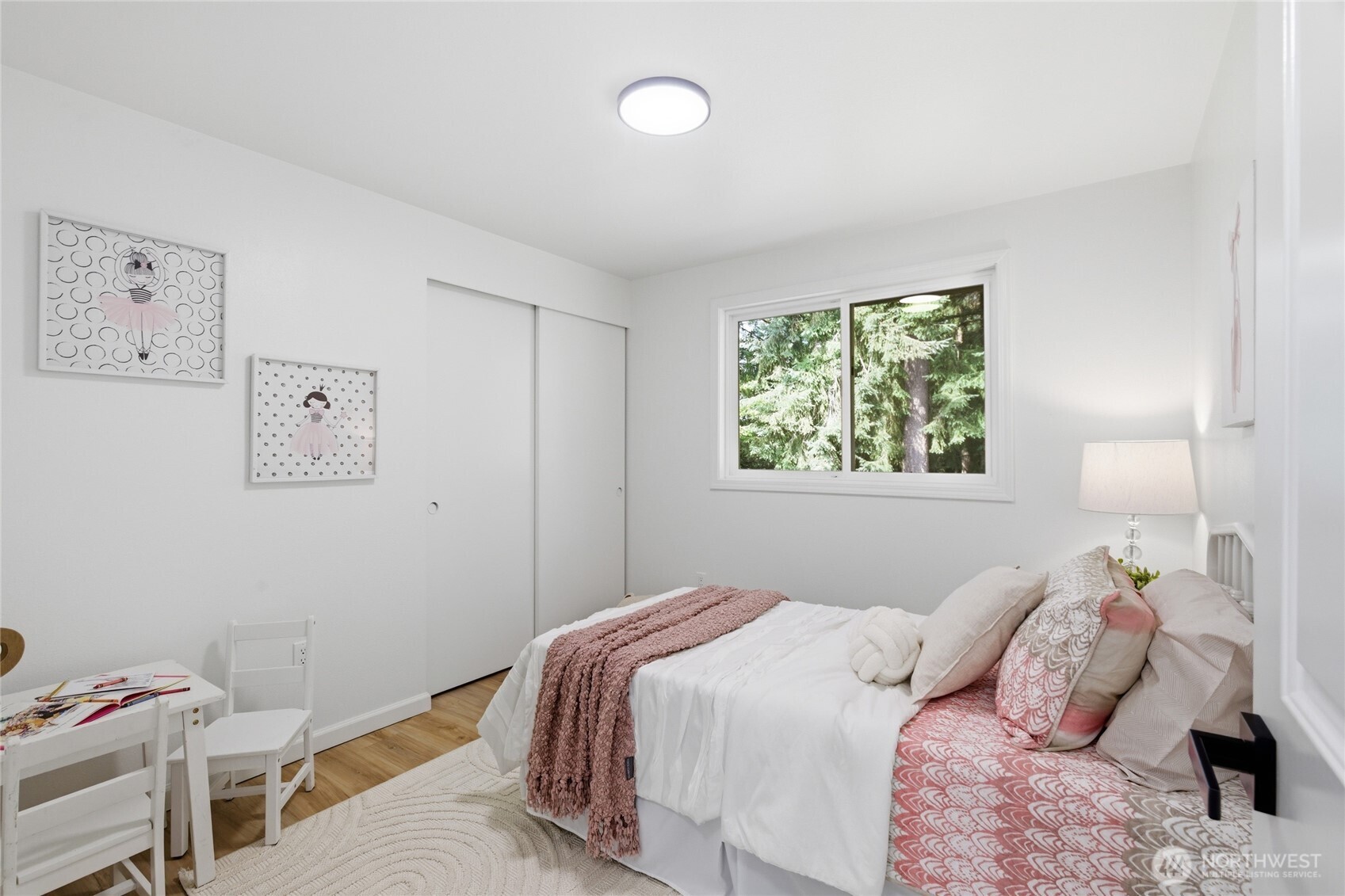 19419 133rd Avenue Southeast Renton, WA 98058 - Photo 26 of 40 a bedroom with a bed and a window