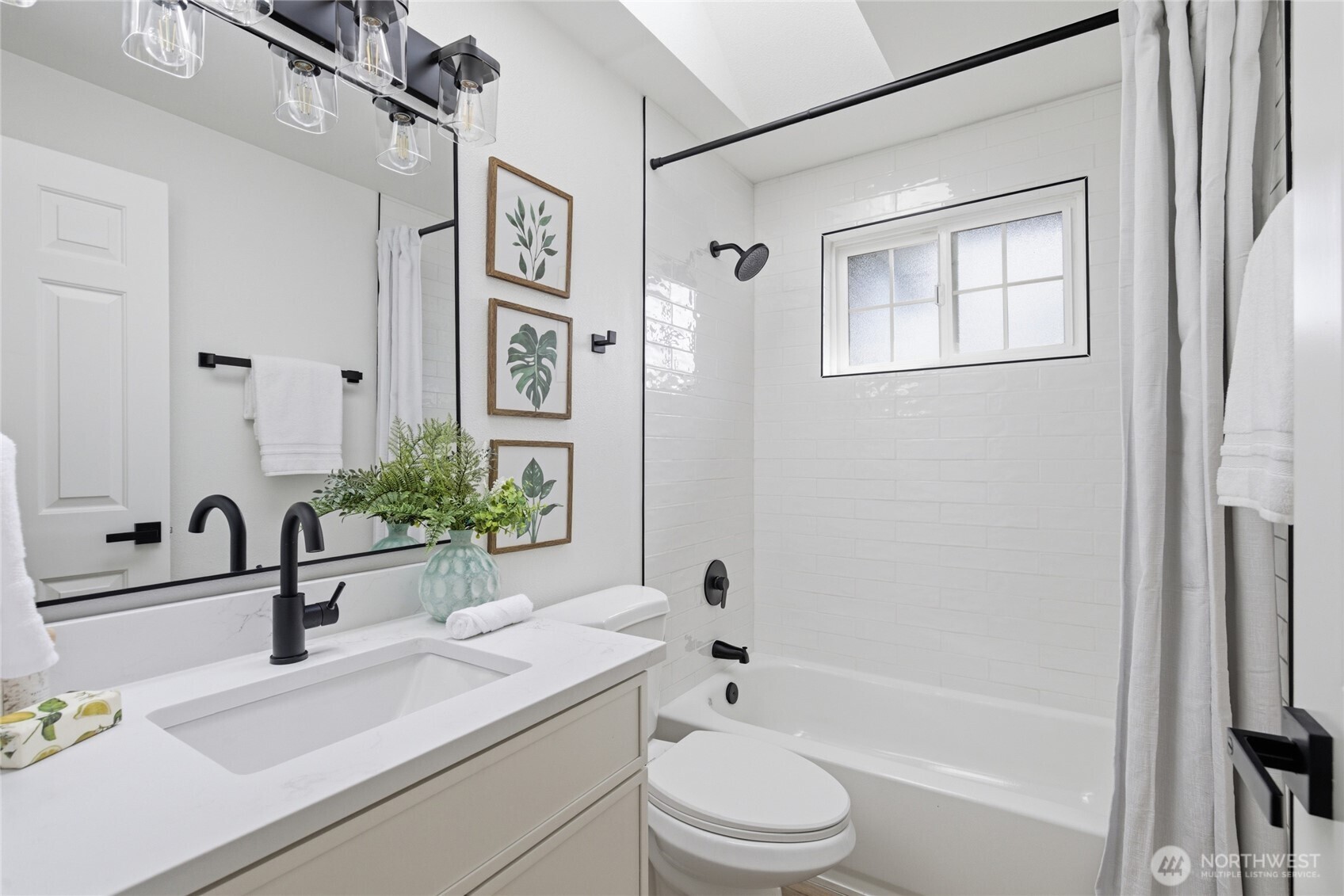 19419 133rd Avenue Southeast Renton, WA 98058 - Photo 27 of 40 a bathroom with a sink a toilet and shower