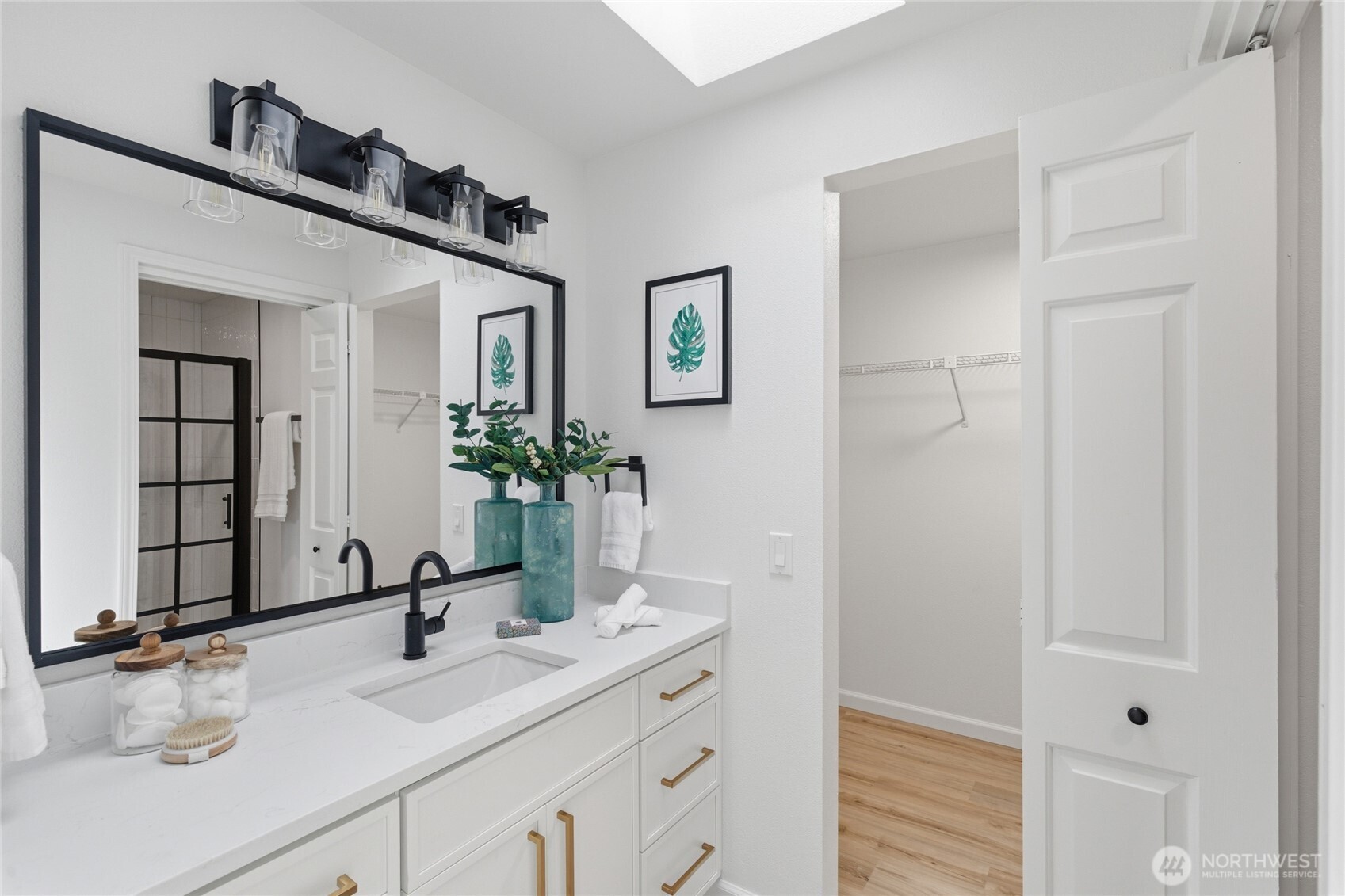 19419 133rd Avenue Southeast Renton, WA 98058 - Photo 31 of 40 a bathroom with a sink and a mirror