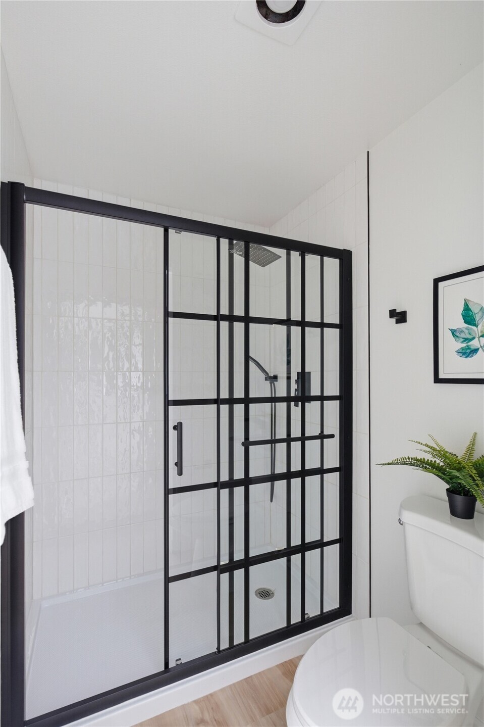 19419 133rd Avenue Southeast Renton, WA 98058 - Photo 33 of 40 a bathroom with a bathtub and shower