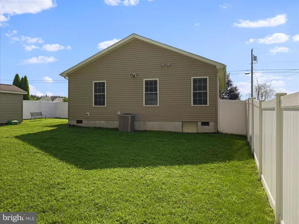 a front view of house with yard