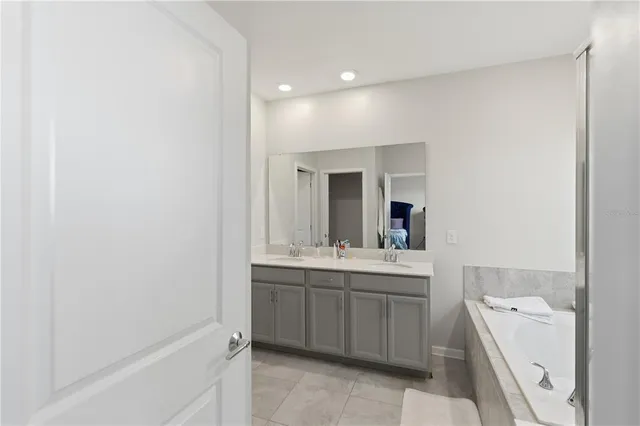 a bathroom with a sink a toilet and vanity