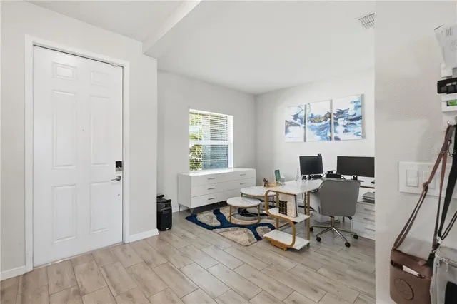 a living room with furniture and a window