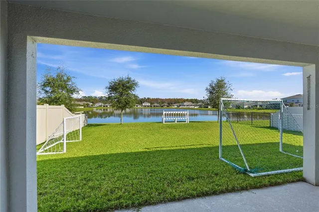 a view of a golf course with a swimming pool
