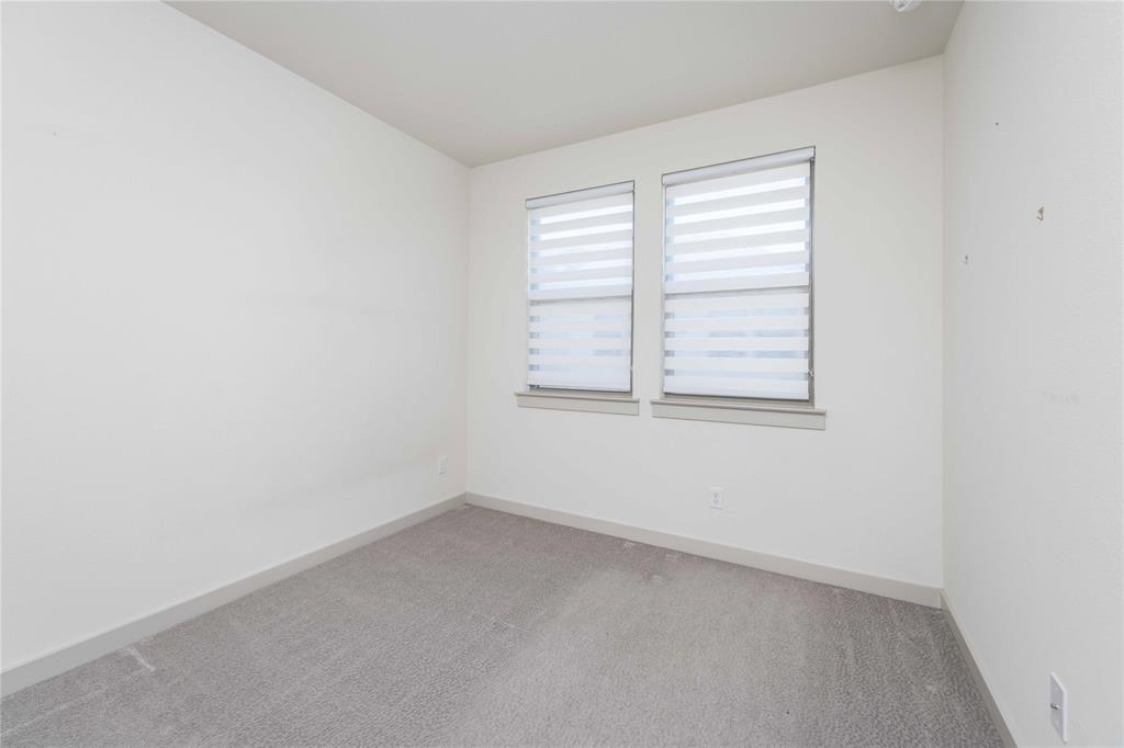 208 Spring Hill Road Flower Mound, TX 75028 - Photo 16 of 35 an empty room with a window